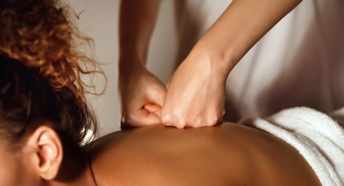 A,Skillful,Deep,Tissue,Massage,Is,Administered,To,An,African