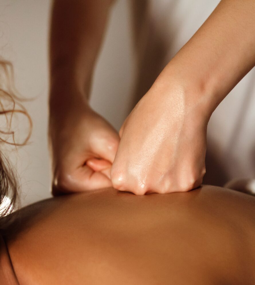 A,Skillful,Deep,Tissue,Massage,Is,Administered,To,An,African